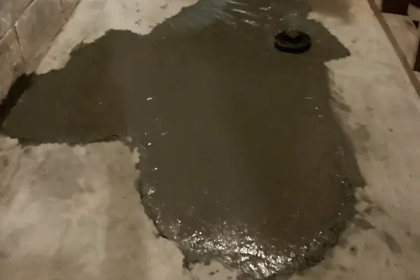 concrete pour over the fixed interior drain.