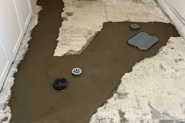 laundry room backfilled with cement after excavation.