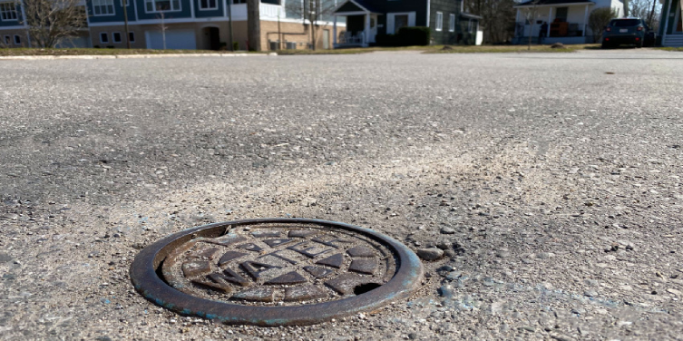 Water service shut off valve cover in concrete